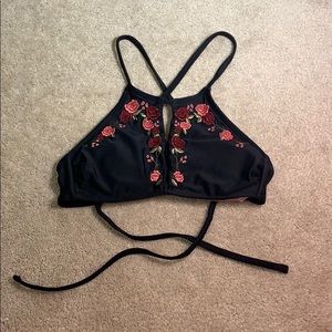 Super cute floral and black halter bikini top.